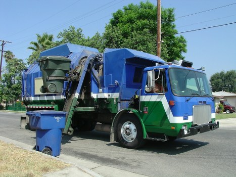 Various types of business waste including recyclables and hazardous materials