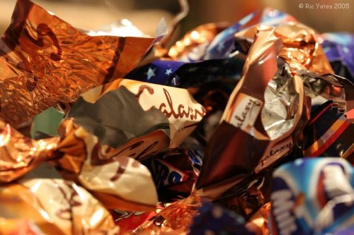 Charity volunteers collecting reusable garden furniture from a clearance